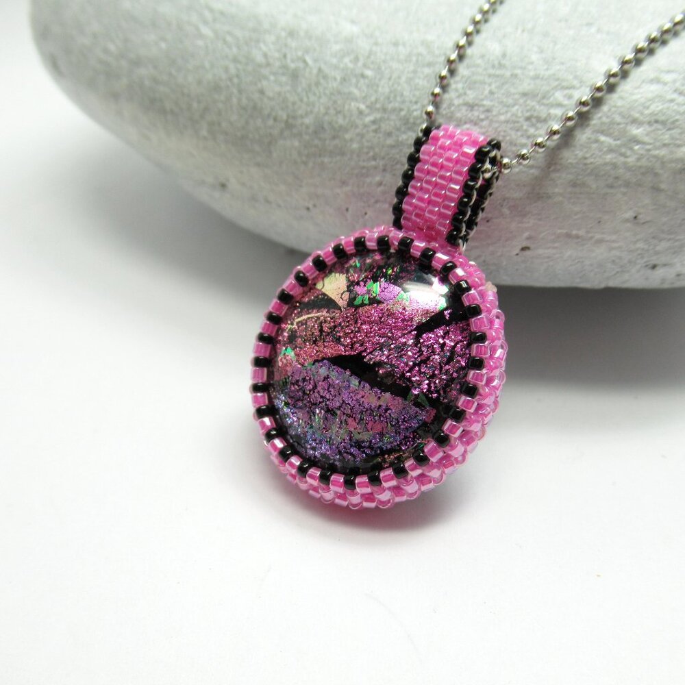 Pink fused glass handwoven pendant